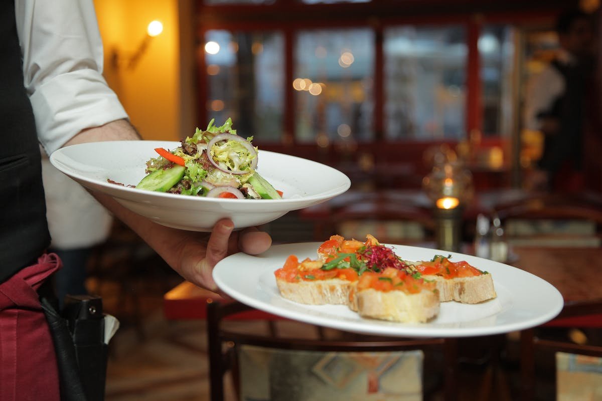 Upscale restaurant interior with moody warm lighting