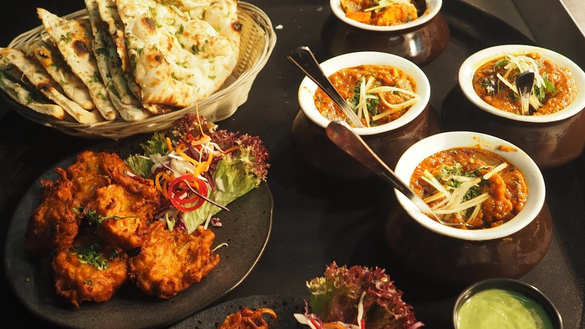 Middle Eastern mezze spread served in elegant setting